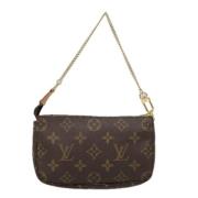 Pre-owned Canvas pouches Louis Vuitton Vintage , Brown , Dames