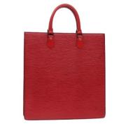 Pre-owned Leather handbags Louis Vuitton Vintage , Red , Dames