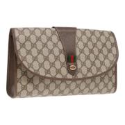 Pre-owned Leather clutches Gucci Vintage , Beige , Dames