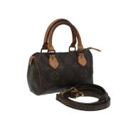 Pre-owned Canvas handbags Louis Vuitton Vintage , Brown , Dames