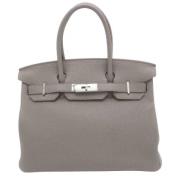 Pre-owned Leather handbags Hermès Vintage , Gray , Dames