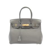 Pre-owned Leather handbags Hermès Vintage , Gray , Dames