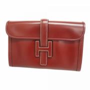 Pre-owned Leather clutches Hermès Vintage , Red , Dames