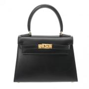 Pre-owned Leather handbags Hermès Vintage , Black , Dames