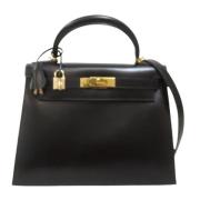 Pre-owned Leather handbags Hermès Vintage , Black , Dames