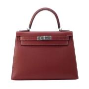 Pre-owned Leather handbags Hermès Vintage , Red , Dames