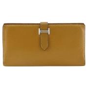 Pre-owned Leather wallets Hermès Vintage , Beige , Dames