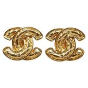 Pre-owned Metal earrings Chanel Vintage , Yellow , Dames