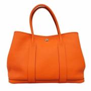 Pre-owned Leather handbags Hermès Vintage , Orange , Dames