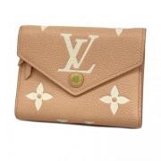 Pre-owned Fabric wallets Louis Vuitton Vintage , Beige , Dames