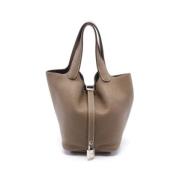 Pre-owned Leather handbags Hermès Vintage , Beige , Dames