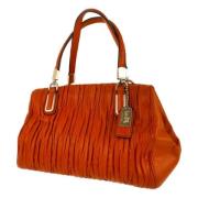 Pre-owned Leather handbags Coach Pre-owned , Orange , Dames