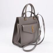 Pre-owned Leather handbags Yves Saint Laurent Vintage , Gray , Dames