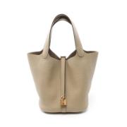 Pre-owned Leather handbags Hermès Vintage , Beige , Dames