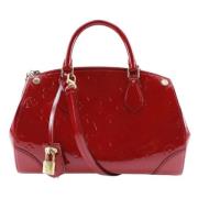 Pre-owned Leather handbags Louis Vuitton Vintage , Red , Dames