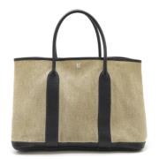 Pre-owned Canvas handbags Hermès Vintage , Beige , Dames