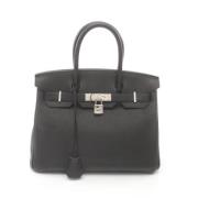 Pre-owned Leather handbags Hermès Vintage , Black , Dames