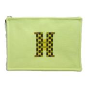 Pre-owned Canvas pouches Hermès Vintage , Yellow , Dames