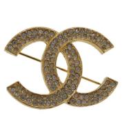 Pre-owned Metal brooches Chanel Vintage , Yellow , Dames