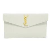 Pre-owned Leather clutches Yves Saint Laurent Vintage , White , Dames