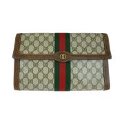 Pre-owned Canvas clutches Gucci Vintage , Beige , Dames