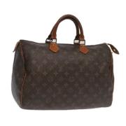 Pre-owned Canvas handbags Louis Vuitton Vintage , Brown , Dames