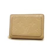 Pre-owned Fabric wallets Louis Vuitton Vintage , Beige , Dames