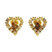 Pre-owned Metal earrings Dior Vintage , Yellow , Dames