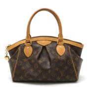 Pre-owned Canvas handbags Louis Vuitton Vintage , Brown , Dames