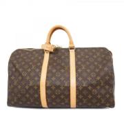 Pre-owned Fabric handbags Louis Vuitton Vintage , Brown , Dames