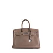 Pre-owned Leather handbags Hermès Vintage , Gray , Dames