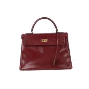 Pre-owned Leather handbags Hermès Vintage , Red , Dames