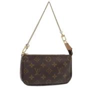 Pre-owned Canvas clutches Louis Vuitton Vintage , Brown , Dames