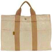 Pre-owned Canvas handbags Hermès Vintage , Beige , Dames