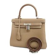 Pre-owned Leather handbags Hermès Vintage , Beige , Dames