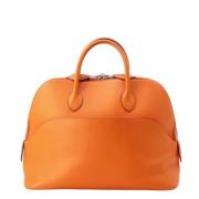 Pre-owned Leather handbags Hermès Vintage , Orange , Dames