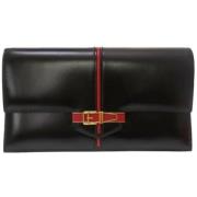 Pre-owned Leather clutches Hermès Vintage , Black , Dames