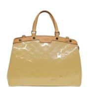 Pre-owned Leather handbags Louis Vuitton Vintage , Beige , Dames