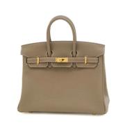 Pre-owned Leather handbags Hermès Vintage , Beige , Dames