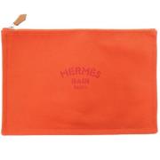 Pre-owned Cotton clutches Hermès Vintage , Orange , Dames