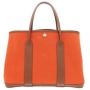 Pre-owned Canvas handbags Hermès Vintage , Orange , Dames