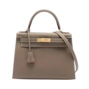 Pre-owned Leather handbags Hermès Vintage , Brown , Dames