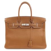 Pre-owned Leather handbags Hermès Vintage , Brown , Dames