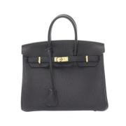 Pre-owned Leather handbags Hermès Vintage , Black , Dames