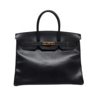 Pre-owned Leather handbags Hermès Vintage , Black , Dames