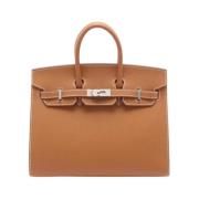 Pre-owned Leather handbags Hermès Vintage , Brown , Dames