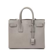 Pre-owned Leather handbags Yves Saint Laurent Vintage , Gray , Dames