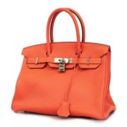 Pre-owned Leather handbags Hermès Vintage , Orange , Dames