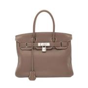 Pre-owned Leather handbags Hermès Vintage , Brown , Dames