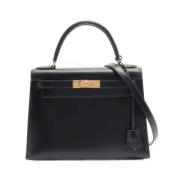 Pre-owned Leather handbags Hermès Vintage , Black , Dames